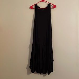 Black sleeveless dress.